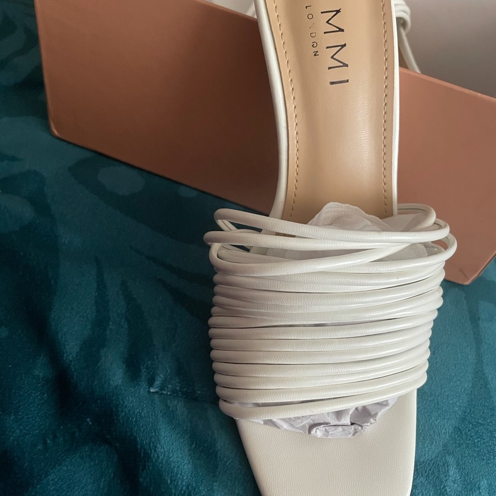 Brand new Simi London mule heels.